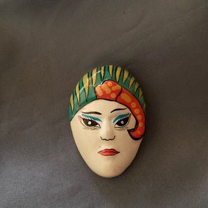 Handmade wooden brooch facial